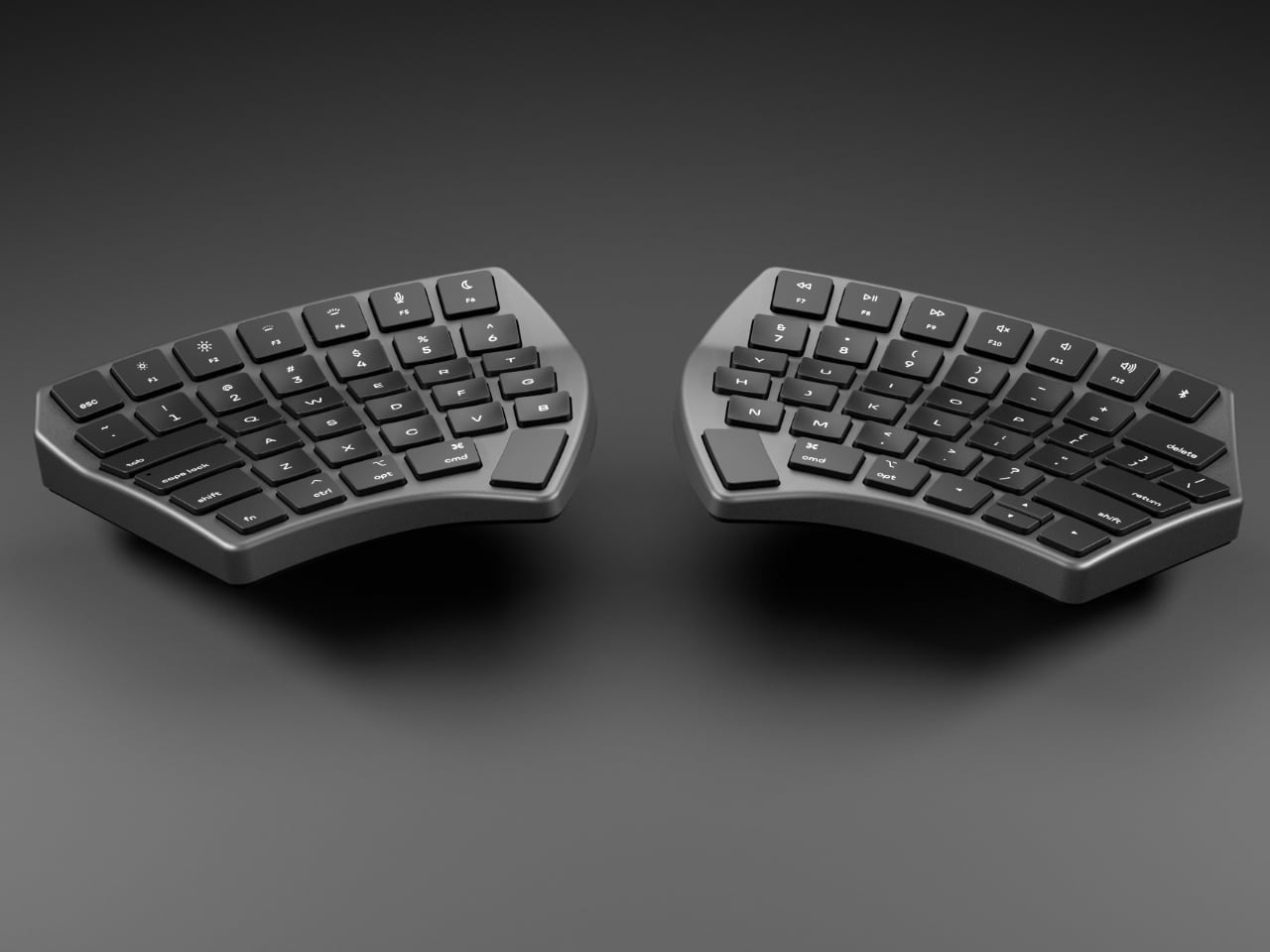 Split ergonomic Bluetooth keyboard designed by NUIO with custom firmware